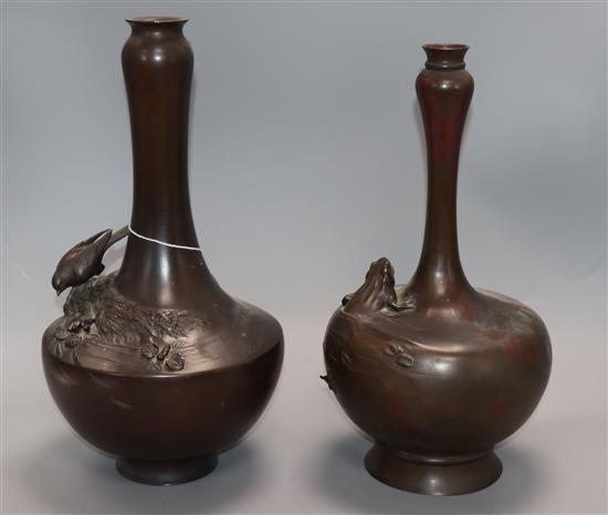 Two Japanese Meiji period bronze vases, cast with a bird and an emerging frog, height 36cm